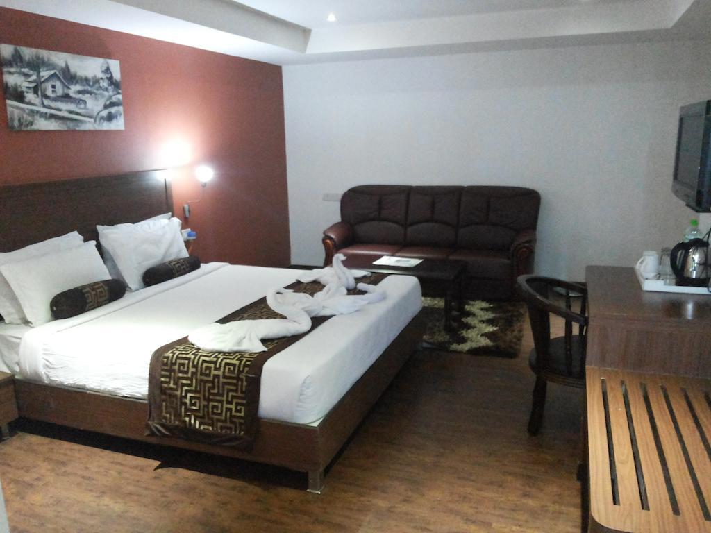 Hotel Milestonnez Sriperumbudur Quarto foto